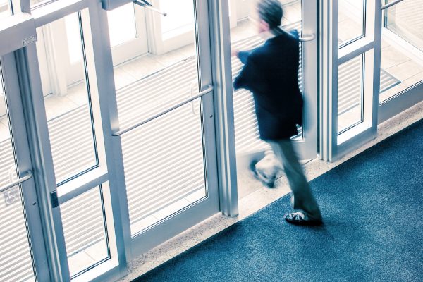 Man walking out of a business office Man walking out of a business office